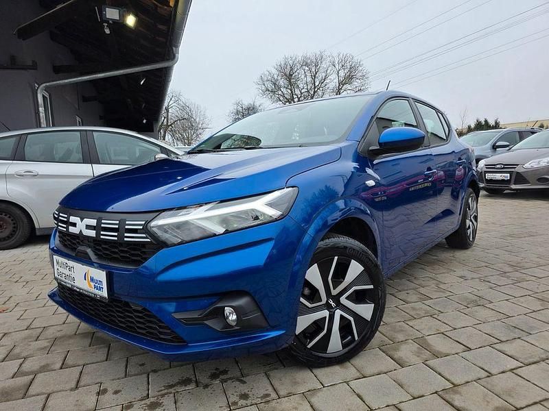 Blau Gebraucht 2024 Dacia Sandero Expression Limousine | 13.990 € (Superpreis) - Bild 1/4