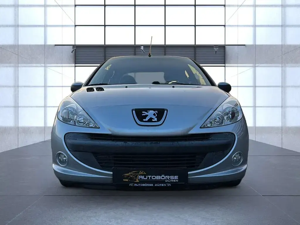 Gebraucht Peugeot 206+ 60 PS (44 kW) 2011 Grau Kleinwagen