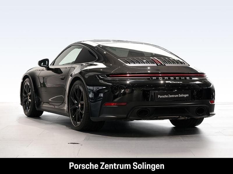 Gebraucht Porsche 992 394 PS (289 kW) 2024 Schwarz Coupé