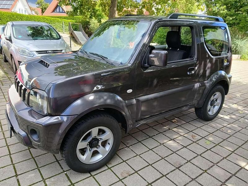 Grau Gebraucht 2014 Suzuki Jimny Ranger SUV | 16.000 € (Teuer) - Bild 1/4
