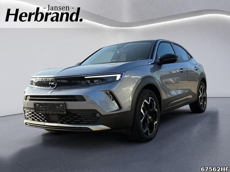 Gebraucht Opel Mokka-e Ultimate 100 kW (136 PS) 2022 Kontrast grau/quarz silber SUV