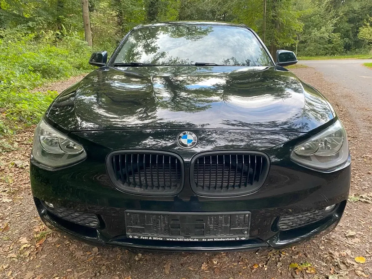 Używany BMW 118 143 KM (105 kW) 2014 Czarny Hatchback