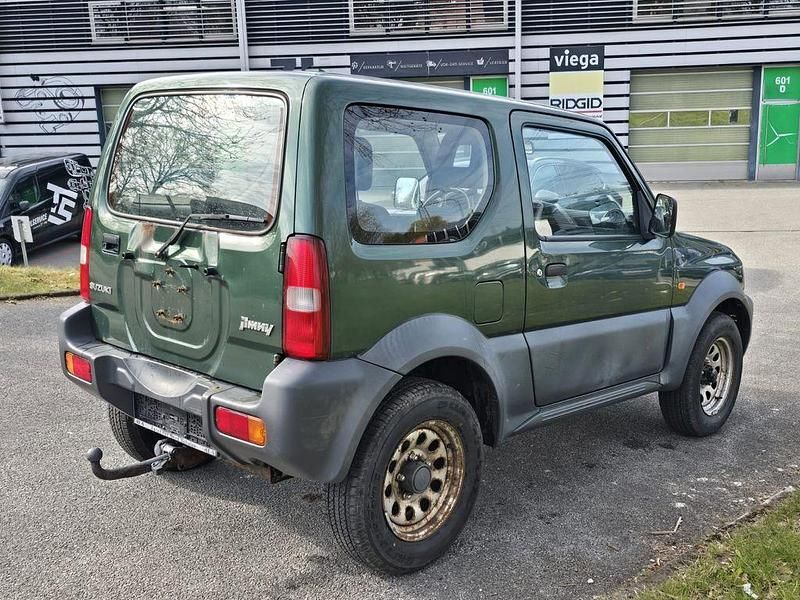 Second-hand Suzuki Jimny Style 86 CP (63 kW) 2012 Verde SUV