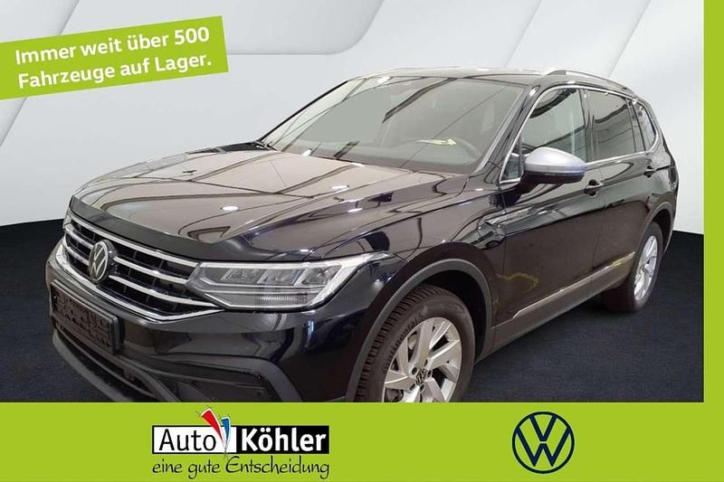 Deep black perleffekt / titans Gebraucht 2024 VW Tiguan Allspace Life SUV | 34.420 € (Superpreis) - Bild 1/3