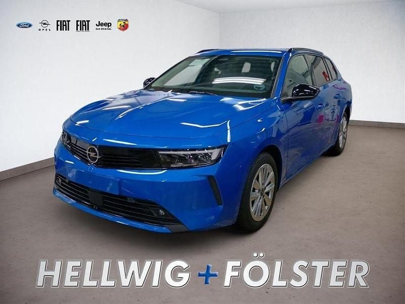 Blau/typ aussenverkleidung met Gebraucht 2024 Opel Astra Enjoy Kombi | 18.990 € (Superpreis) - Bild 1/4