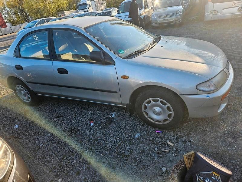 Second-hand Mazda 323 1996 Auriu Berlinǎ