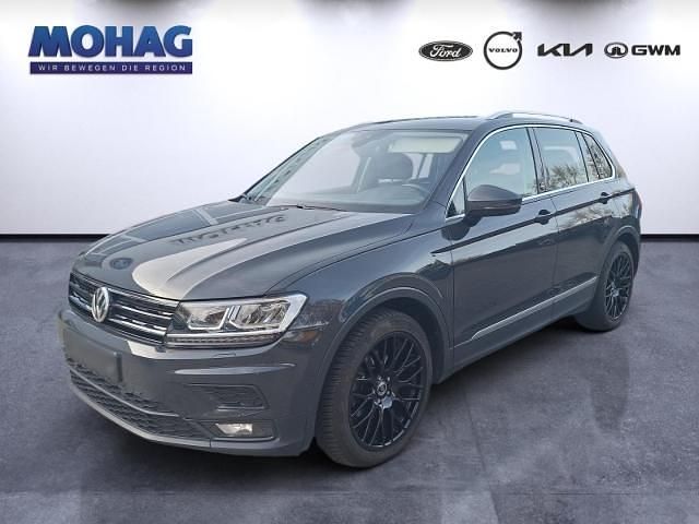 Grau Gebraucht 2018 VW Tiguan Sound SUV | 18.590 € (Fairer Preis) - Bild 1/4