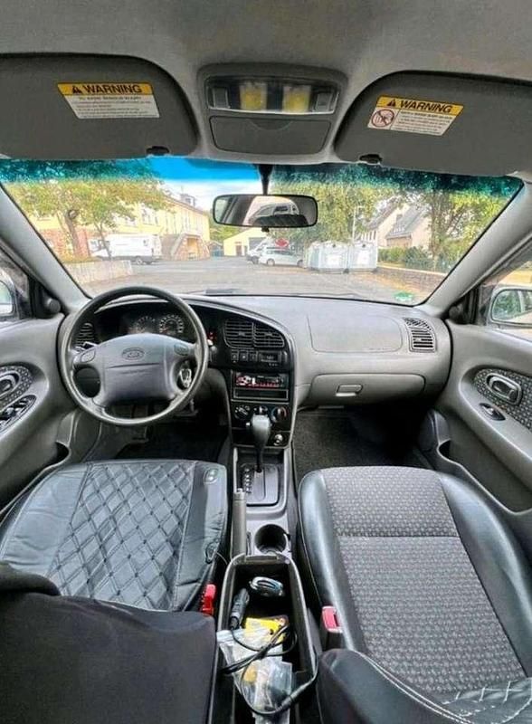 Gebraucht Kia Shuma 102 PS (75 kW) 2002 Gold Kleinwagen