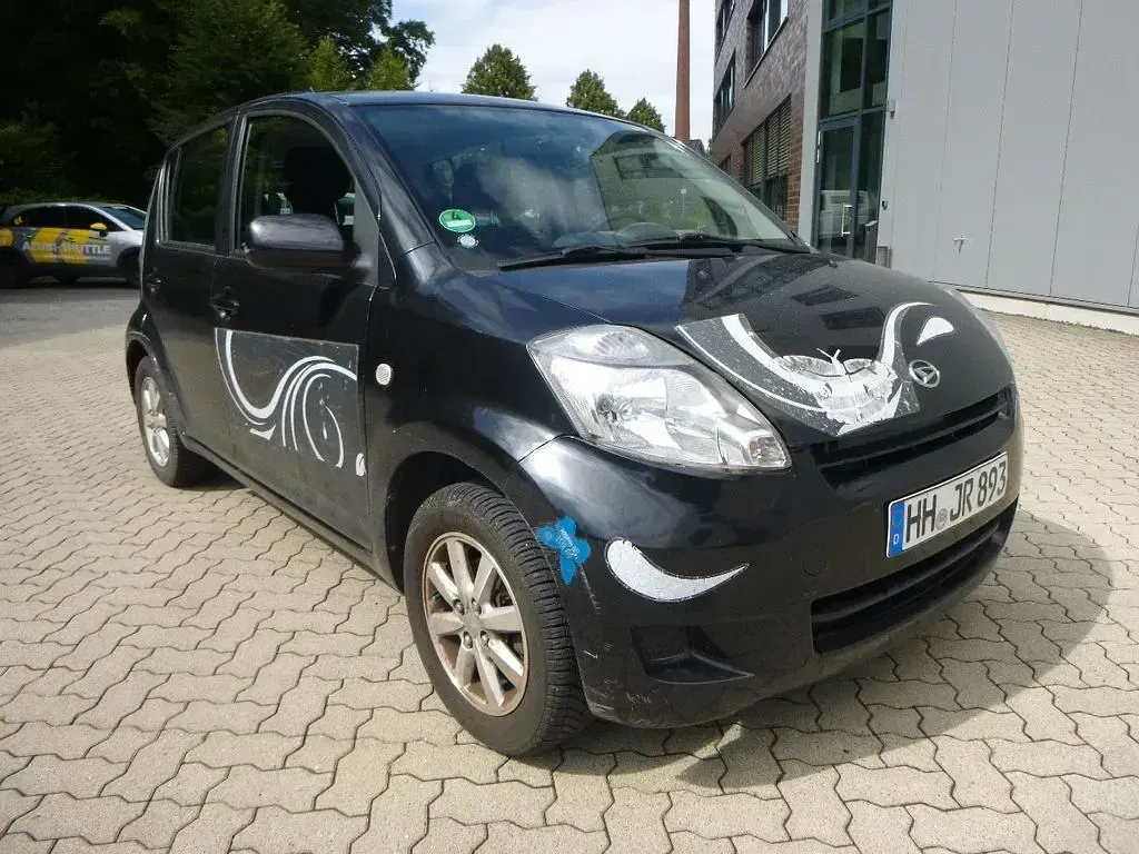Gebraucht Daihatsu Sirion 91 PS (66 kW) 2009 Schwarz Kleinwagen