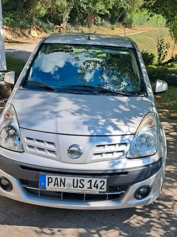 Gebraucht Nissan Pixo 68 PS (50 kW) 2012 Grau Kleinwagen