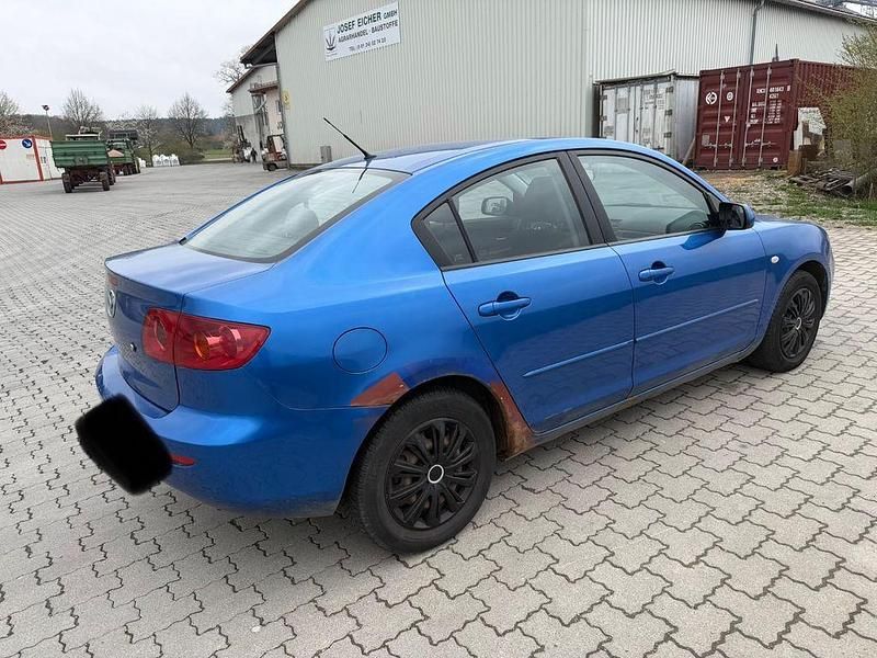 Używany Mazda 3 Comfort 105 KM (77 kW) 2004 Niebieski Sedan/Limuzyna