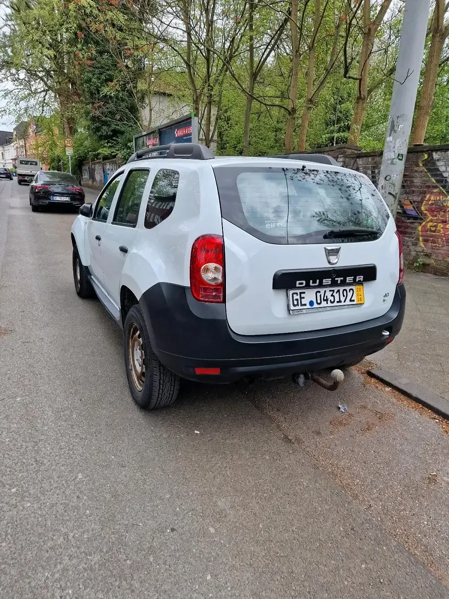 Używany Dacia Duster 101 KM (74 kW) 2012 Biały SUV