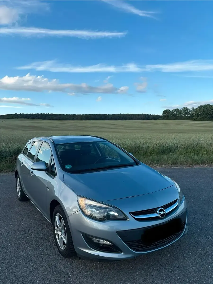 Gebraucht Opel Astra 110 PS (80 kW) 2014 Grau Kombi