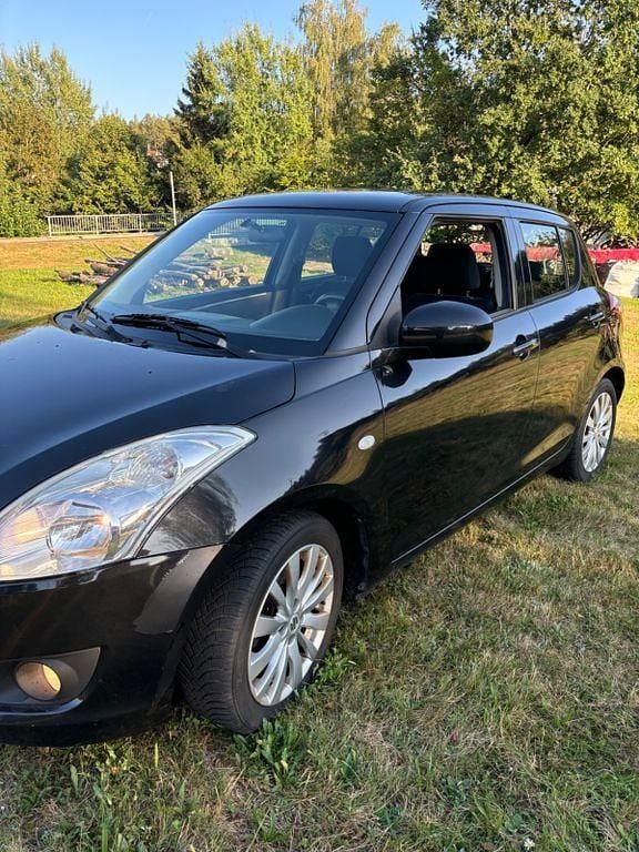 Gebraucht Suzuki Swift 94 PS (69 kW) 2011 Schwarz Kleinwagen