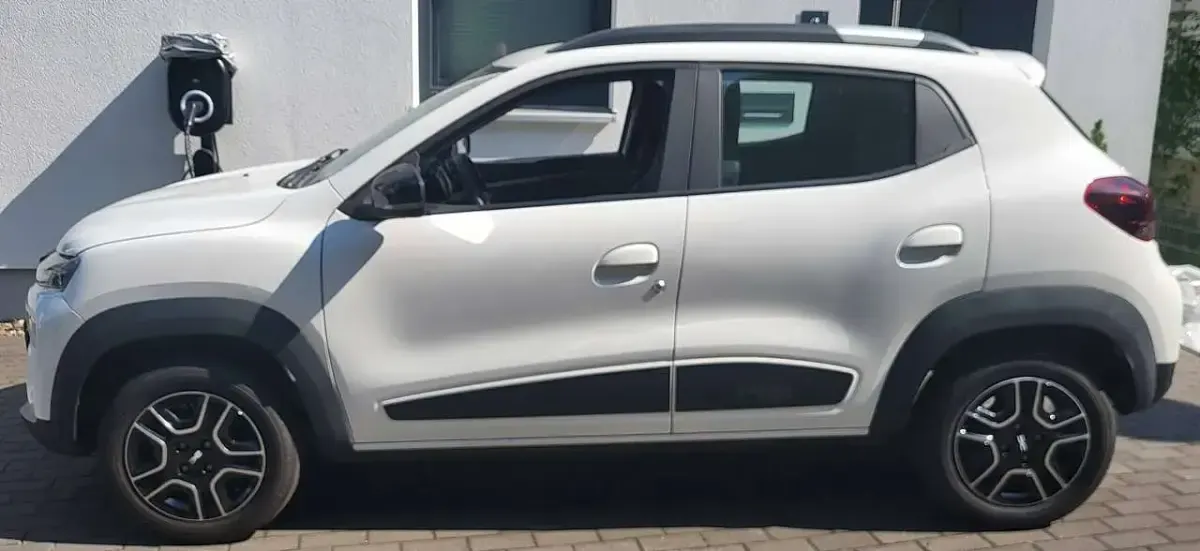 Gebraucht Dacia Spring Essentiel 33 kW (45 PS) 2023 Polarweiss Kleinwagen
