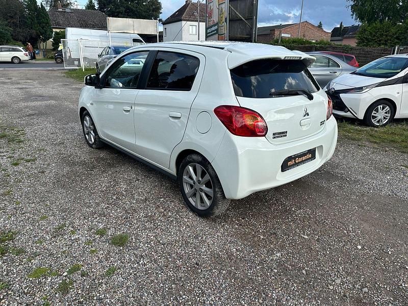 Gebraucht Mitsubishi Space Star 80 PS (58 kW) 2014 Weiß Kleinwagen
