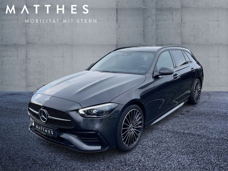 Graphitgrau (metallic) Gebraucht 2024 Mercedes C220 AMG Kombi | 44.257 € (Teuer) - Bild 1/4