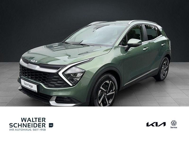 Experience green met. (metallic) Gebraucht 2024 Kia Sportage Vision SUV | 27.450 € (Superpreis) - Bild 1/4