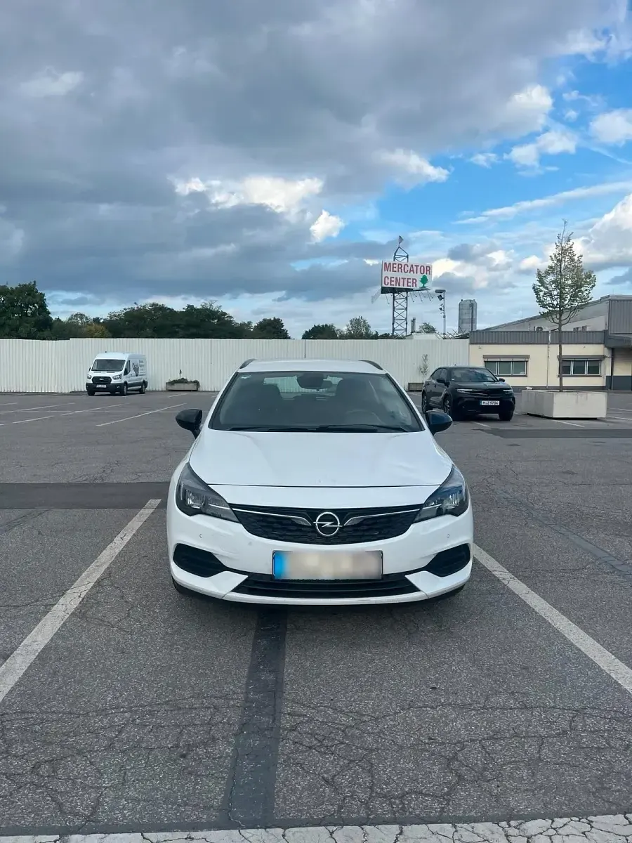 Gebraucht Opel Astra 125 PS (91 kW) 2021 Weiß Kombi