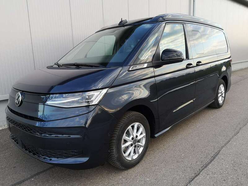 Mediumblau metallic dach schwarz Neu 2025 VW T7 Beach Van | 61.490 € - Bild 1/4