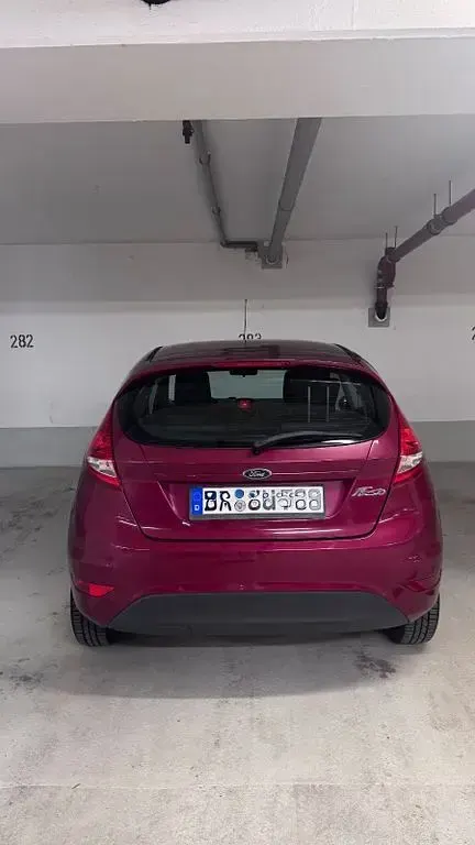 Second-hand Ford Fiesta Trend 82 CP (60 kW) 2009 Roșu Berlinǎ