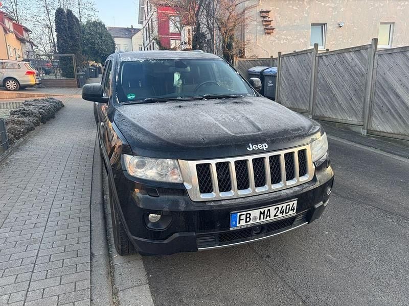 Gebraucht Jeep Grand Cherokee Overland 241 PS (177 kW) 2012 Schwarz SUV