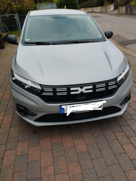 Silber Gebraucht 2023 Dacia Sandero Essentiel Kleinwagen | 11.700 € (Superpreis) - Bild 1/4