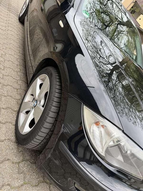 Second-hand BMW 116 122 CP (89 kW) 2011 Negru Hatchback