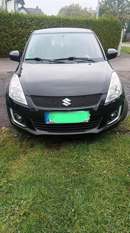 Schwarz Gebraucht 2015 Suzuki Swift Kleinwagen | 5.990 € (Fairer Preis) - Bild 1/4