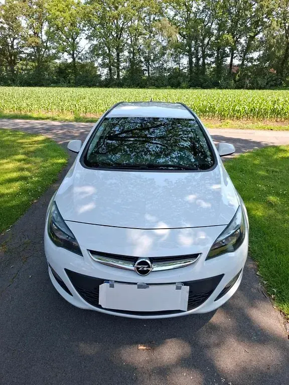 Gebraucht Opel Astra Edition 110 PS (80 kW) 2015 Grün Kombi
