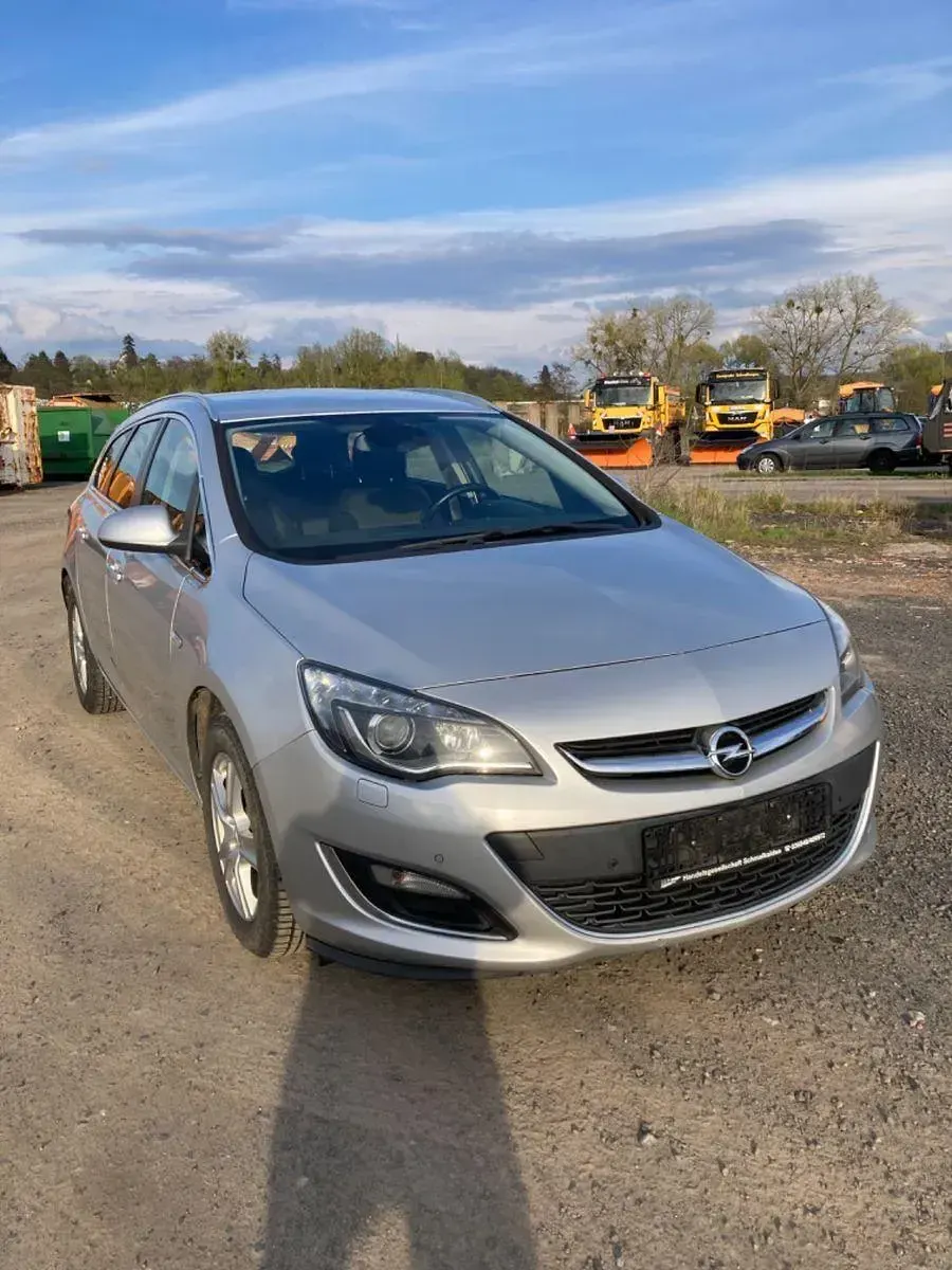 Second-hand Opel Astra 131 CP (96 kW) 2014 Argintiu Break