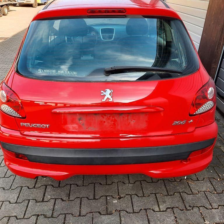 Gebraucht Peugeot 206+ 68 PS (50 kW) 2011 Rot Kleinwagen