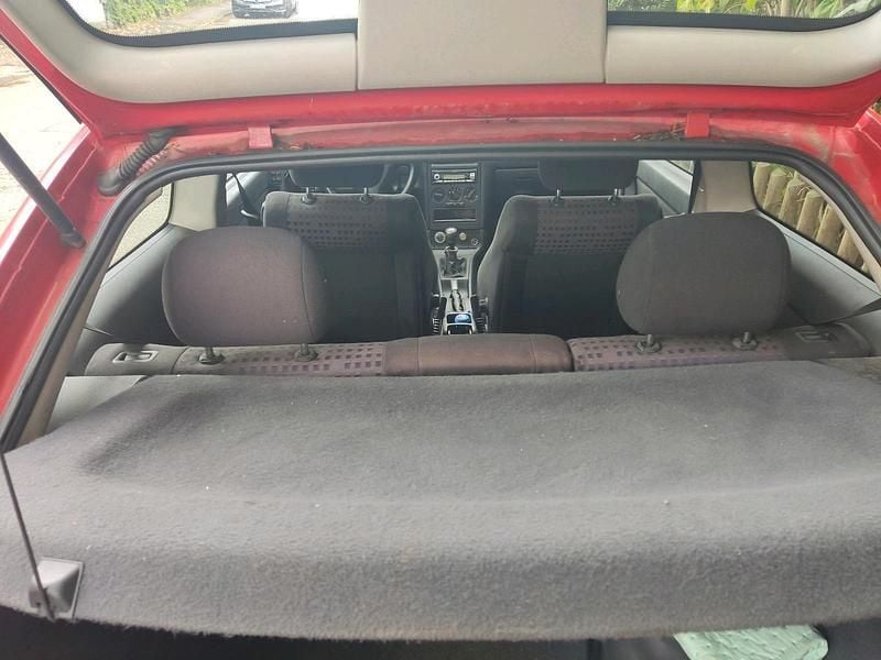 Second-hand Opel Astra 101 CP (74 kW) 2000 Roșu Coupe