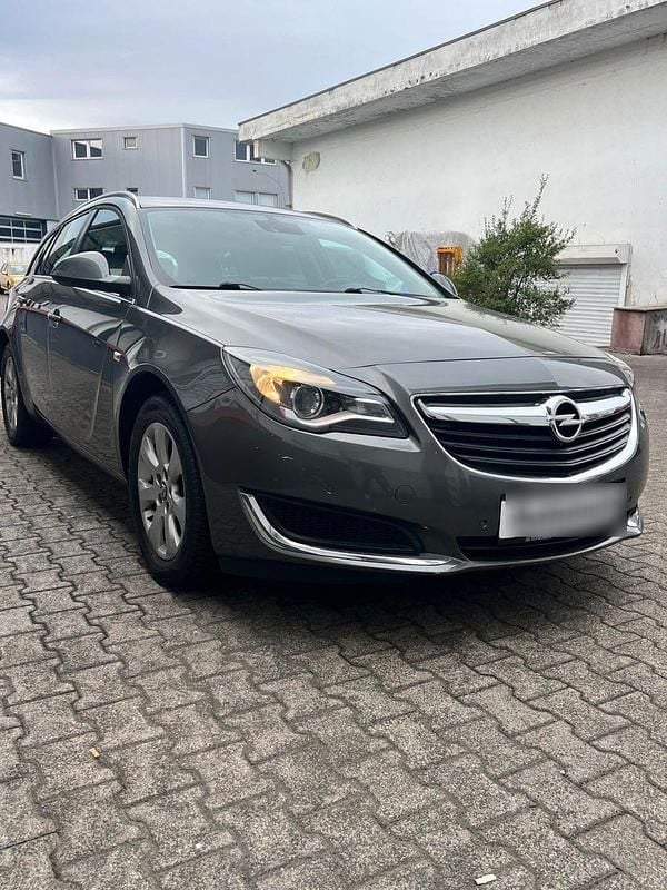 Grün Gebraucht 2017 Opel Insignia Kombi | 6.999 € (Superpreis) - Bild 1/4