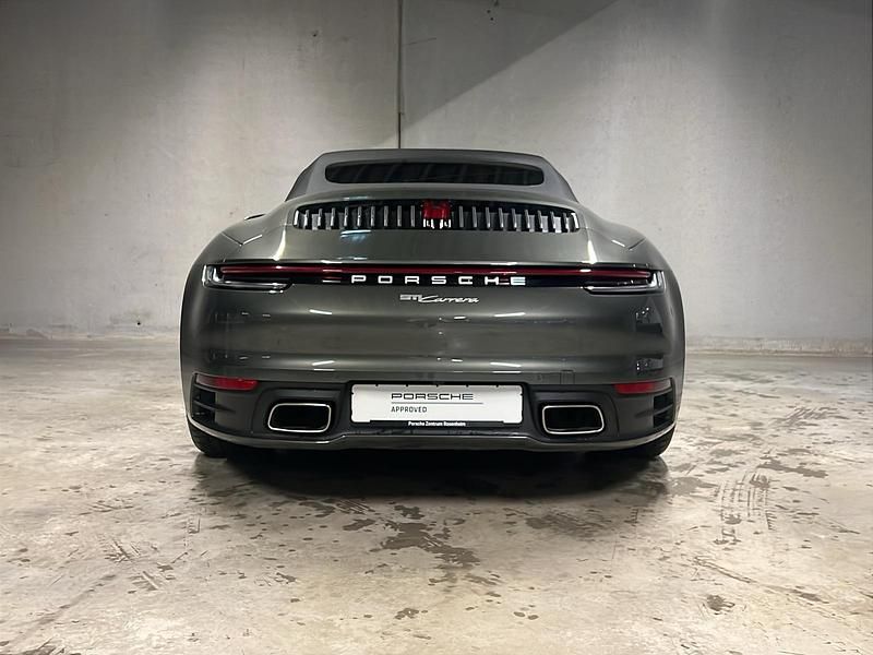 Gebraucht Porsche 911 Carrera 385 PS (283 kW) 2024 Aventuringrünmetallic Cabrio