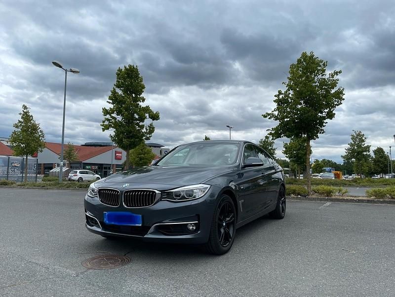 Grau Gebraucht 2014 BMW 328 Gran Turismo Luxury Line Limousine | 21.500 € - Bild 1/4