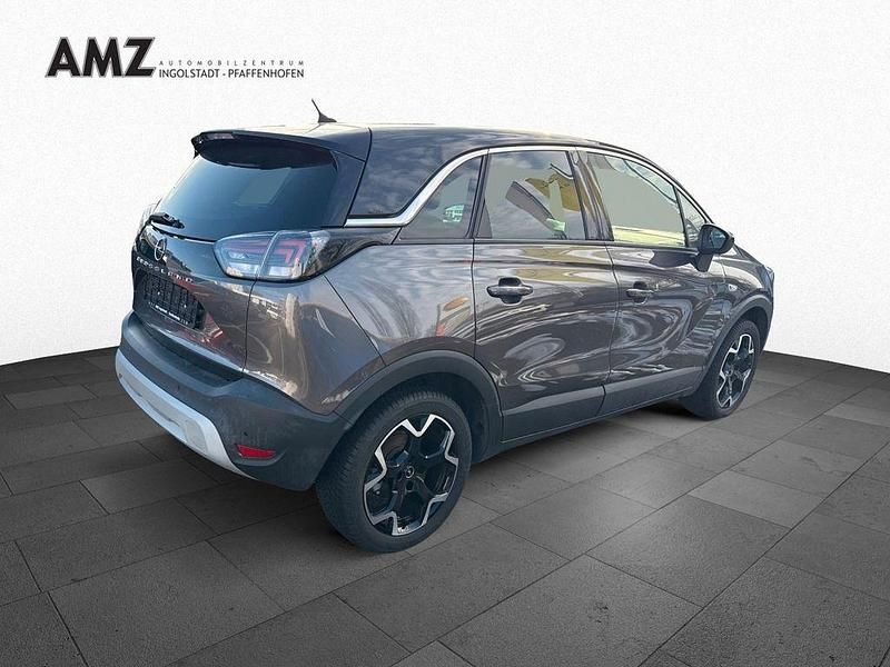 Gebraucht Opel Crossland X Elegance 131 PS (96 kW) 2023 Mondstein grau/e:vulkan grau (metallic) SUV