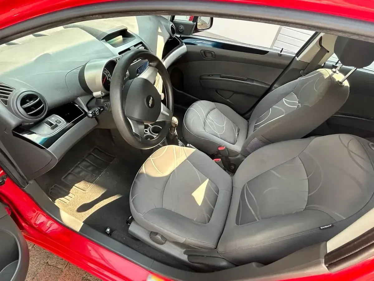 Gebraucht Chevrolet Spark 68 PS (50 kW) 2013 Rot Kleinwagen