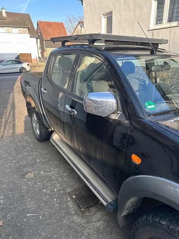 Gebraucht Mitsubishi L200 136 PS (100 kW) 2006 Schwarz Abholung