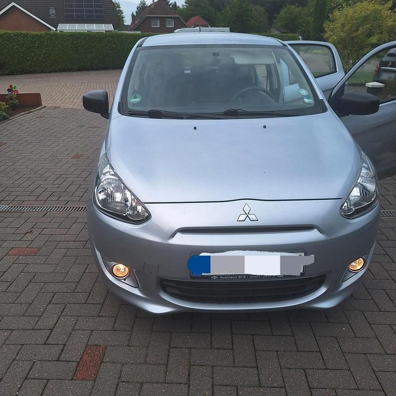 Second-hand Mitsubishi Space Star 71 CP (52 kW) 2015 Argintiu Hatchback