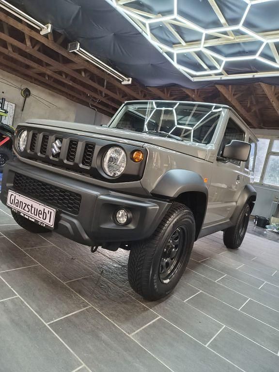 Grau Gebraucht 2023 Suzuki Jimny SUV | 32.000 € (Fairer Preis) - Bild 1/4
