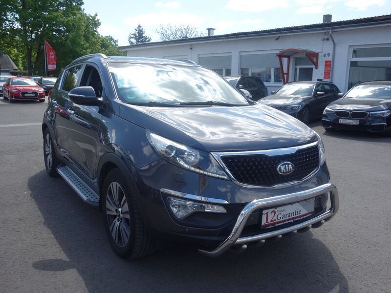 Grau Gebraucht 2015 Kia Sportage Spirit SUV | 11.490 € (Fairer Preis) - Bild 1/4