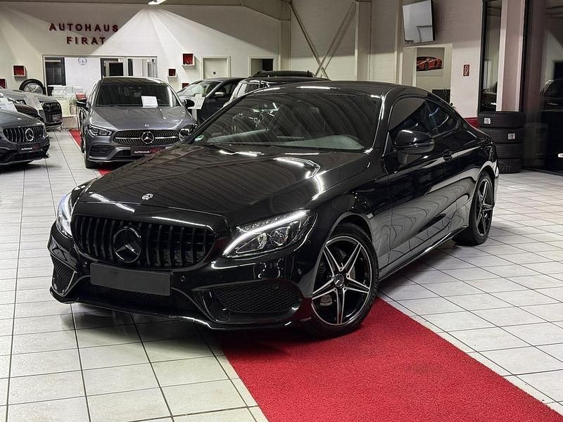 Schwarz Gebraucht 2016 Mercedes C220 AMG line Coupé | 28.449 € - Bild 1/4