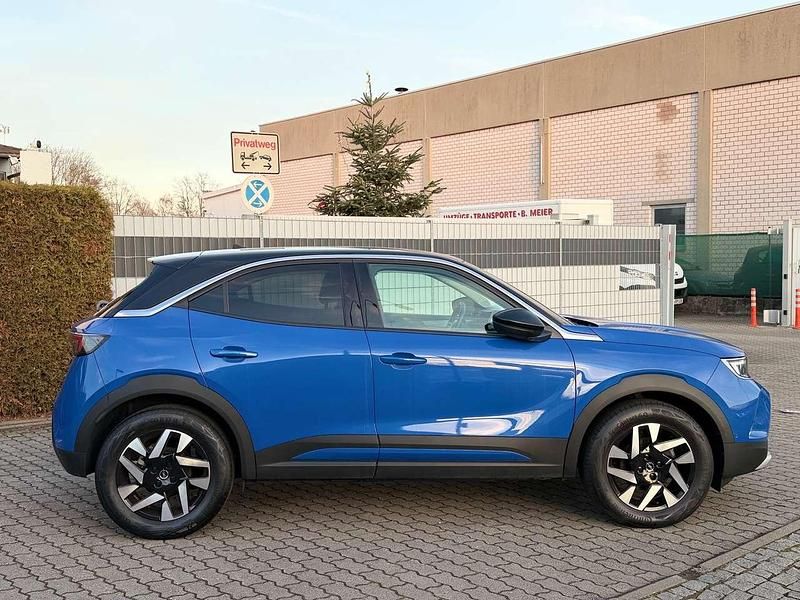 Gebraucht Opel Mokka Elegance 101 PS (74 kW) 2023 Perl blau/voltaik blau SUV