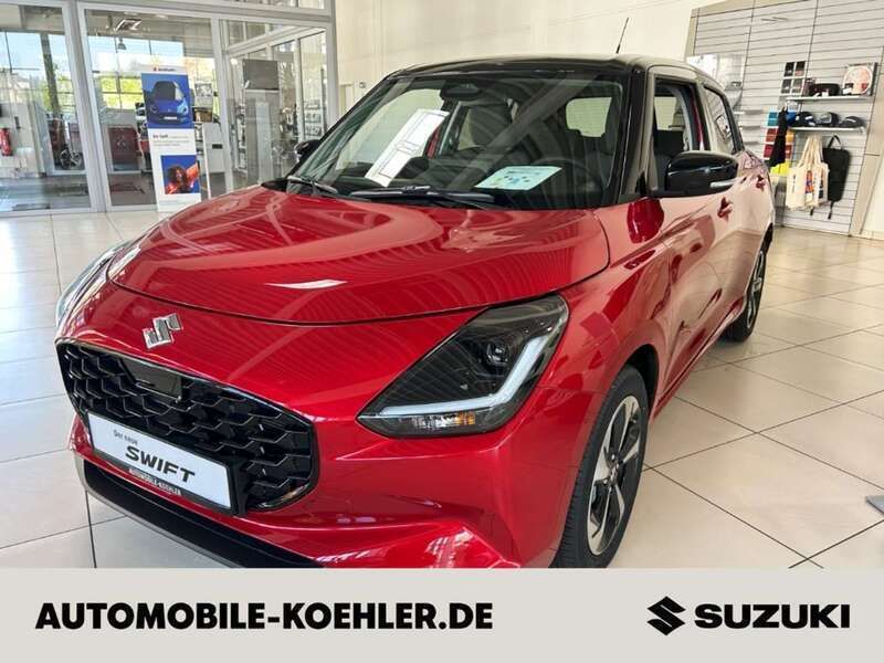 Burning red /super black pearl (rot) Neu 2025 Suzuki Swift Comfort+ Limousine | 19.400 € - Bild 1/4