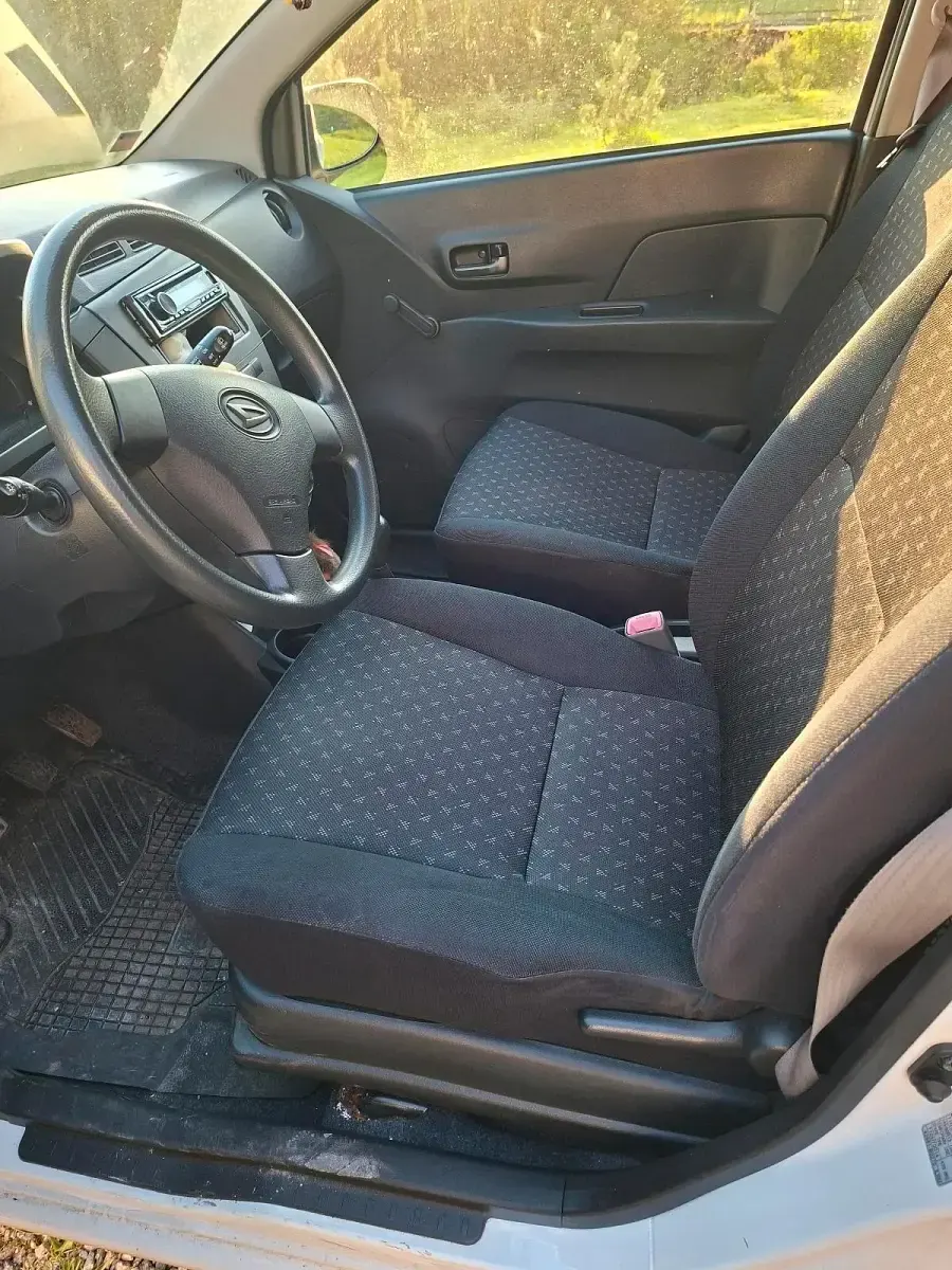 Gebraucht Daihatsu Cuore 70 PS (51 kW) 2010 Weiß Kleinwagen