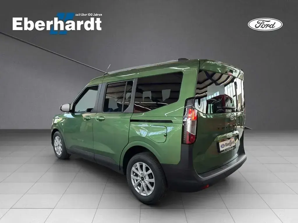 Gebraucht Ford Tourneo Courier Titanium 125 PS (91 kW) 2025 Bursting green Van / Kleinbus