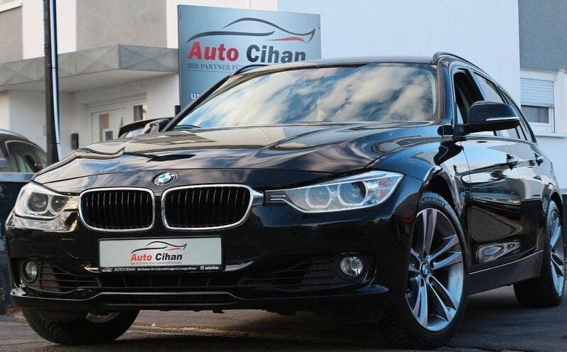 Schwarz Gebraucht 2013 BMW 320 Comfort Edition Kombi | 7.390 € (Superpreis) - Bild 1/4