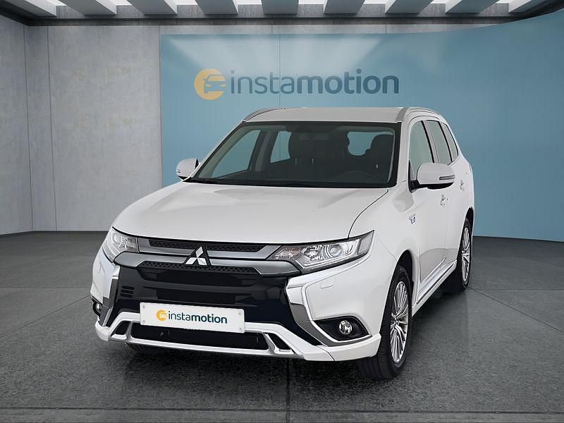 Weiß Gebraucht 2021 Mitsubishi Outlander P-HEV SUV | 21.749 € (Guter Preis) - Bild 1/4