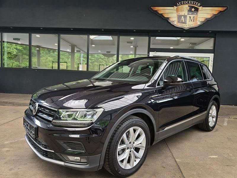 Deep black perleffekt (metallic) Gebraucht 2018 VW Tiguan Highline SUV | 19.950 € (Fairer Preis) - Bild 1/4